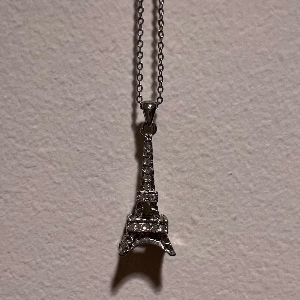 Silver Eiffel Tower necklace with diamonds